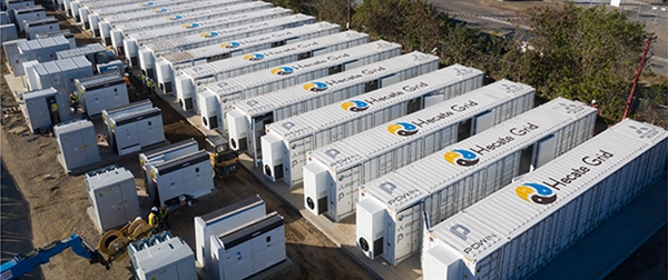 A containerised battery storage project in California, branded with Hecate Grid logo. 