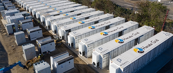 A containerised battery storage project in California, branded with Hecate Grid logo.