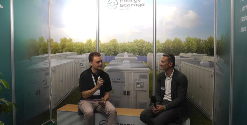 Simon Slapka, MD for Data Services, BayWa r.e., with Energy-Storage.news' Cameron Murray at the Smarter E Europe trade show last month