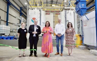 Australia's resources minister Madeleine King (centre) cuts the ribbon to officially open the plant. Image: AVL.