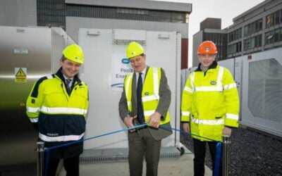 Irish transport minister Eamon Ryan (centre) cuts the ribbon to inaugurate the 75MW/150MWh Poolbeg BESS in the Republic of Ireland's capital, Dublin, flanked by ESB's Jim Dollard (left) and Fluence's SVP and EMEA president Paul McCusker. Images: Fluence via LinkedIn.