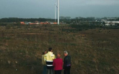 Giga Storage CEO (second from left) with the owners of the site observing where the project will be built. Image: Giga Storage via Vimeo.