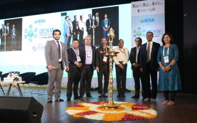 A traditional lamp lighting ceremony at India Energy Storage Week 2023. Dr Rahul Walawalkar is third from left. Image: India Energy Storage Alliance.