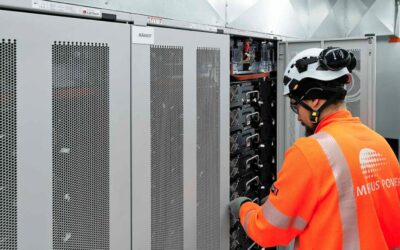 A battery energy storage comprising LG Chem units being worked on by a Merus Power worker.