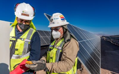 Workers at one of the utility's existing PV plants in Chile. Image:  Colbún
