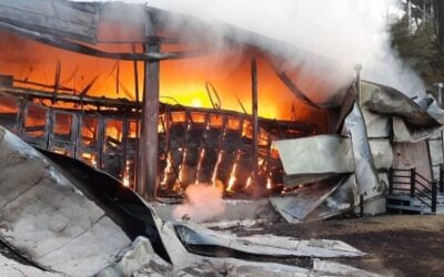 A battery energy storage facility burns after a failure event. Post-incident reviews often trace these outcomes back to upstream decisions and handoff gaps—long before problems surface in the field. Image: Intertek