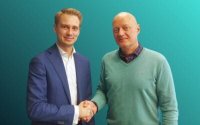 Steffen Schülzchen, founder and CEO of Entrix, shakes hands on the deal with João Manso Neto, CEO of Greenvolt Group. Image: Entrix.