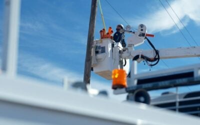 Xcel Energy staff working on repairing power lines after heavy winds (not in New Mexico)