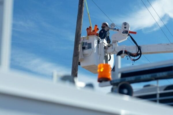 Xcel Energy staff working on repairing power lines after heavy winds (not in New Mexico)
