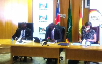 NamPower managing director Kahenge S Haulofu, National Planning Commission director general Obeth Kandjoze and KfW's Barbara Pirich at a signing ceremony earlier this month. Image: NamPower via LinkedIn.
