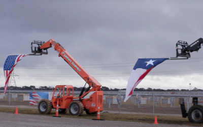 US and Texas flags at the project site during the celebration in Denton County, Texas, last week. Image: National Grid Renewables YouTube video screenshot.