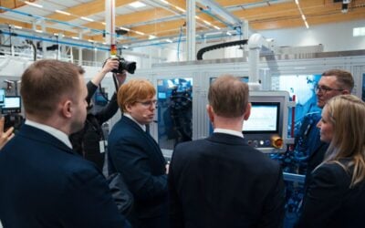 Skeleton Tech CEO Taavi Madiberk shows guests around the SuperFactory in Germany. Image: Taavi Madiberk via LinkedIn