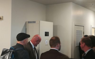 A sonnen battery storage system in the living room of an apartment aJournalists given a tour of the Soleil Lofts project in 2018 Image: Andy Colthorpe / Solar Media.