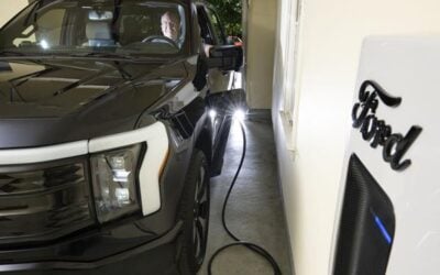 Maryland resident Brian Foreman sits in his F-150 Lightning Truck as it participates in a vehicle-to-home bidirectional charging programme. Image: Sunrun.