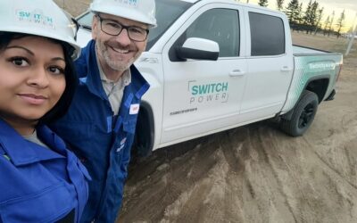 Switch Power team members visiting the potential site for a client's community solar project in 2022. Image: Switch Power via Twitter.